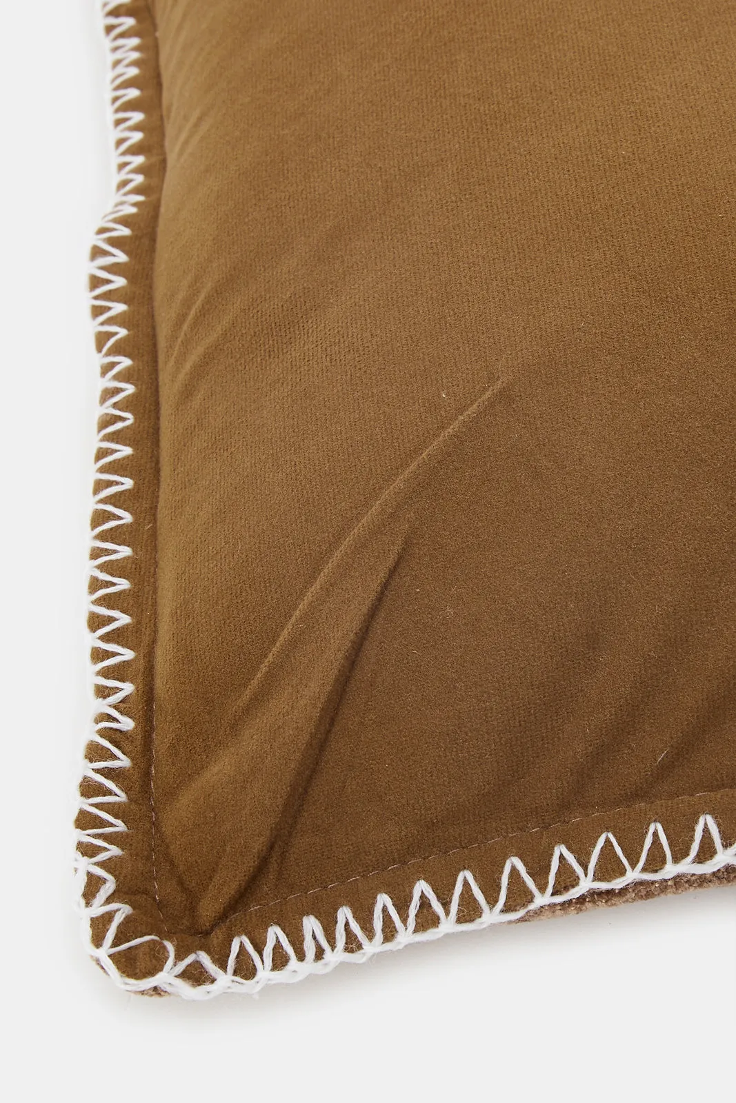 Brown Cushion With Overlocked Stitch